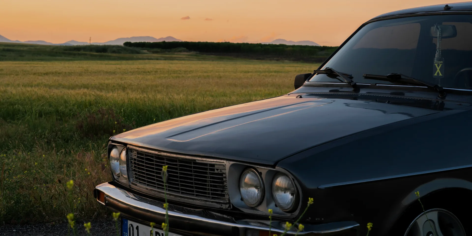 Classic collector vehicle photographed for condition and market appraisal