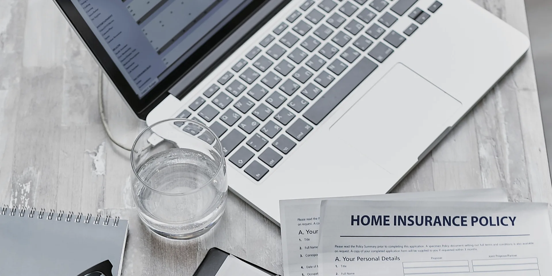 Insurance paperwork and vehicle key prepared for an appraisal assignment